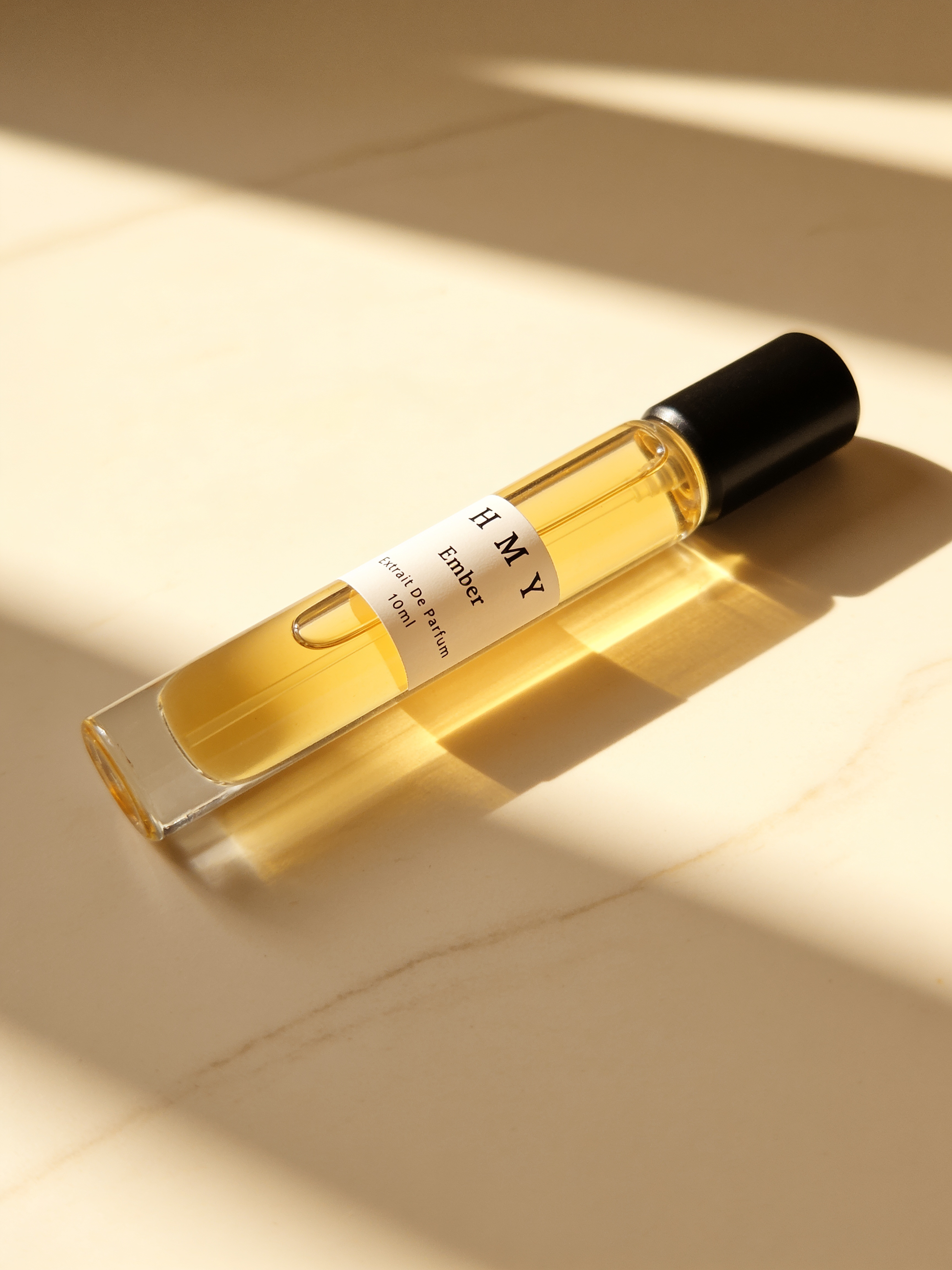 HMY Ember 10 ml discovery bottle in afternoon light